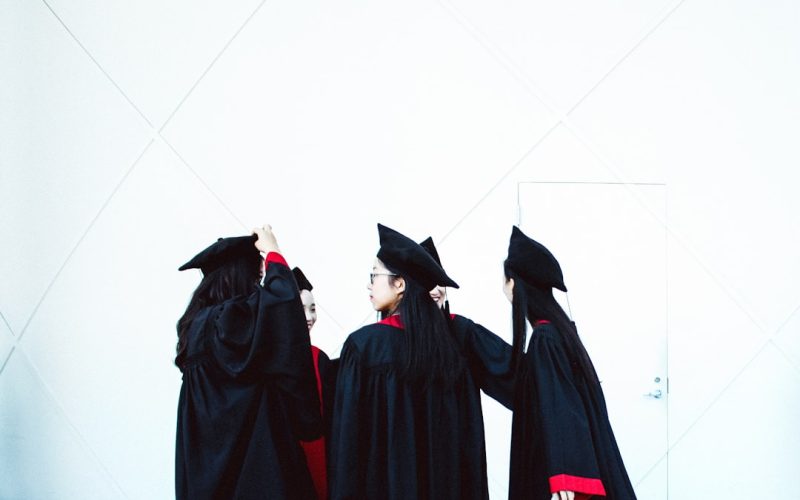 people in academic dress standing