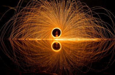 person holding circular light