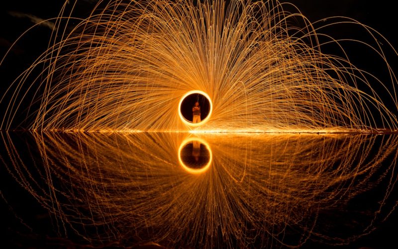 person holding circular light