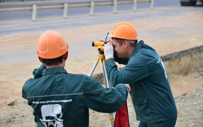 a couple of men standing next to each other