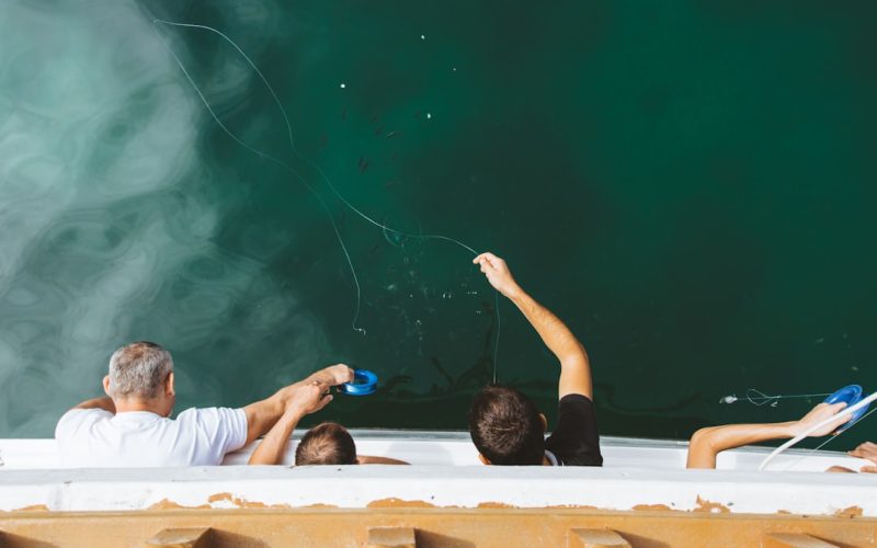 four men on hot tub
