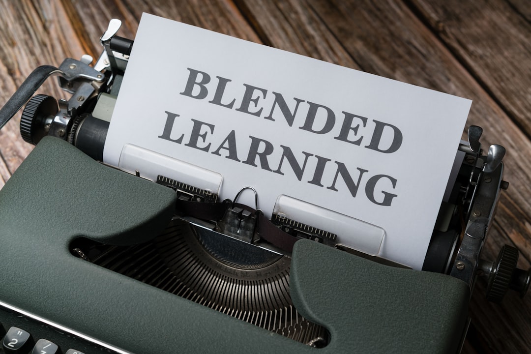 a close up of a typewriter with a sign that reads blended learning