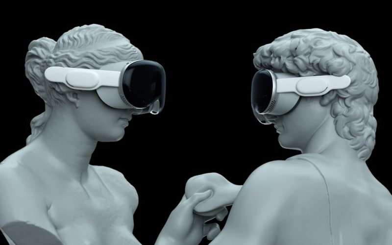 a couple of statues wearing virtual glasses