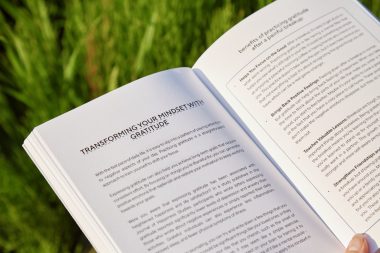 A person holding a book in their hands