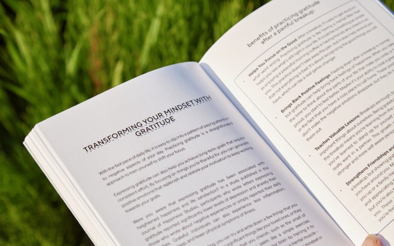 A person holding a book in their hands