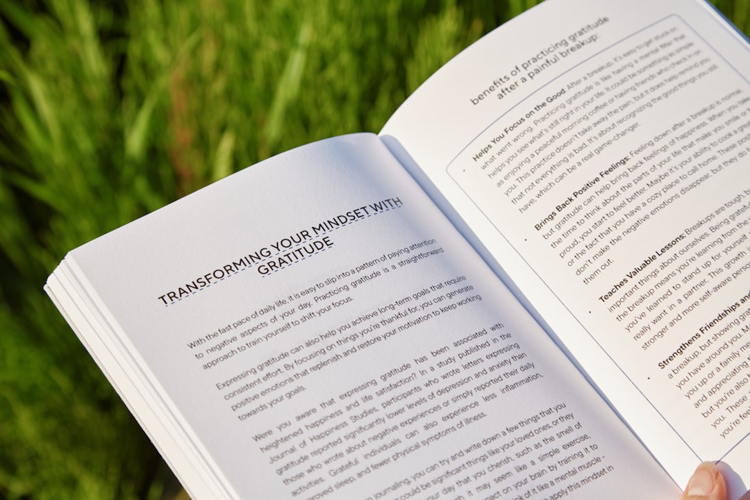 A person holding a book in their hands