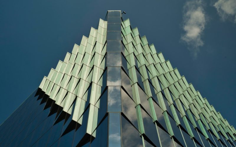 A very tall building with a sky in the background