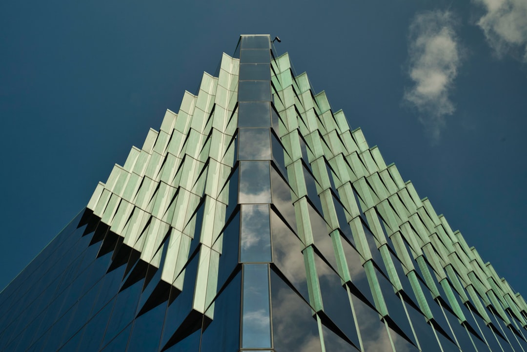 A very tall building with a sky in the background
