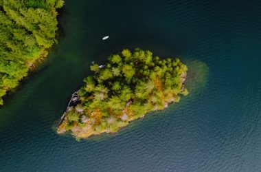 a small island in the middle of a body of water