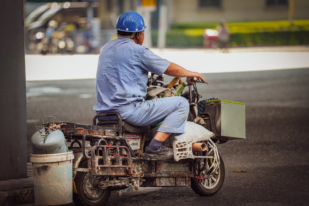 a man riding a scooter